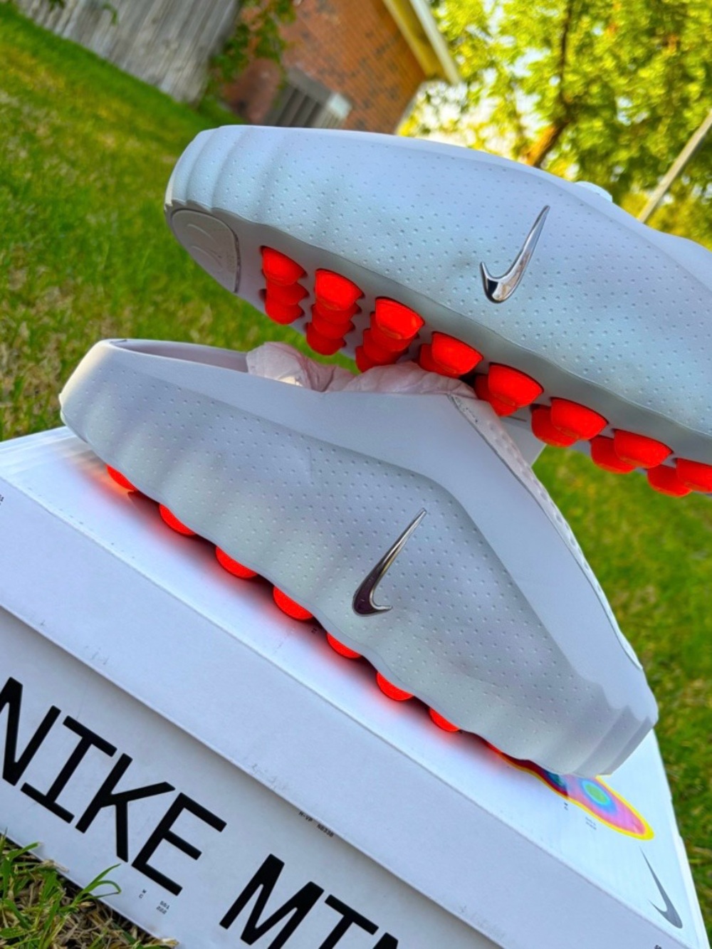 Nike Mind Gray Slide Sandals with Bright Orange Studded Outsole